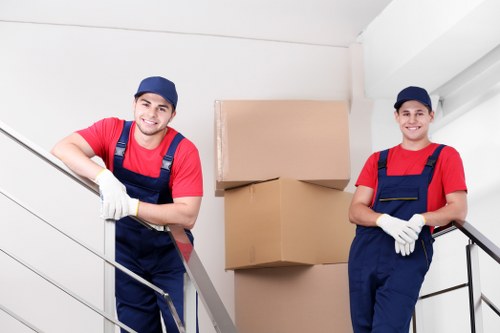 Professional removal services team preparing boxes for transport