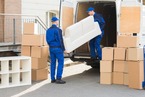 Organized moving boxes and packing supplies for apartment relocation