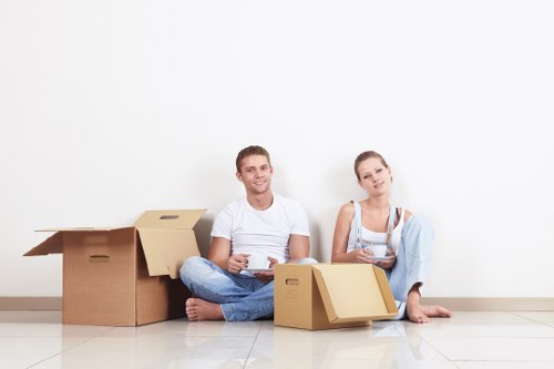 Professional movers loading furniture into a truck
