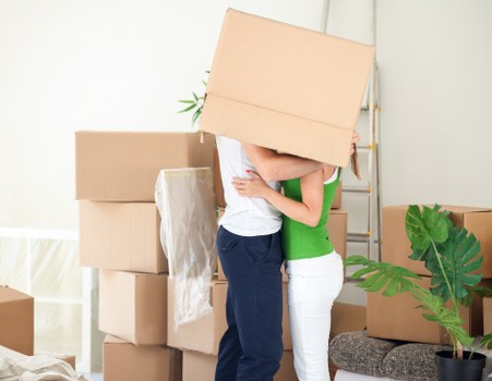 Team organizing boxes for a residential relocation