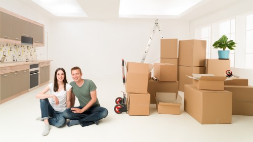 Office relocation team handling workstations and technology setup