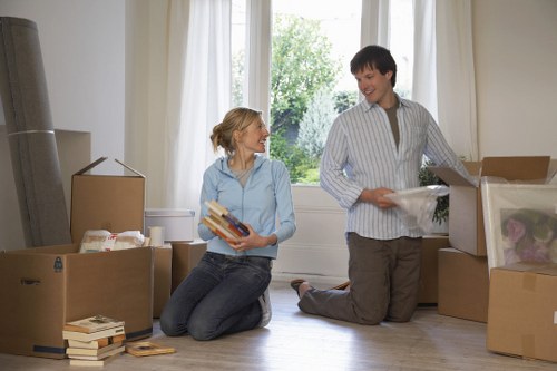 Customer and driver reviewing a van service agreement and load details