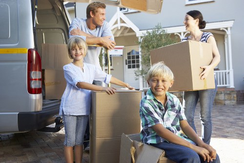 Reliable moving team preparing items for safe delivery