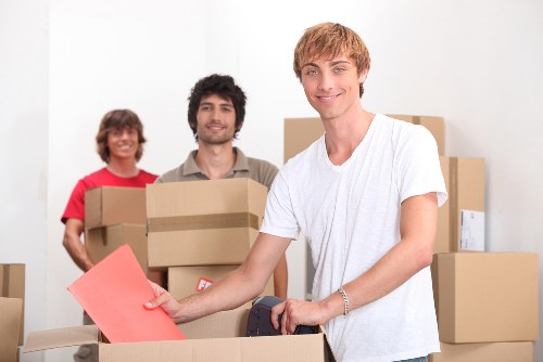 Moving truck and labeled boxes ready for relocation